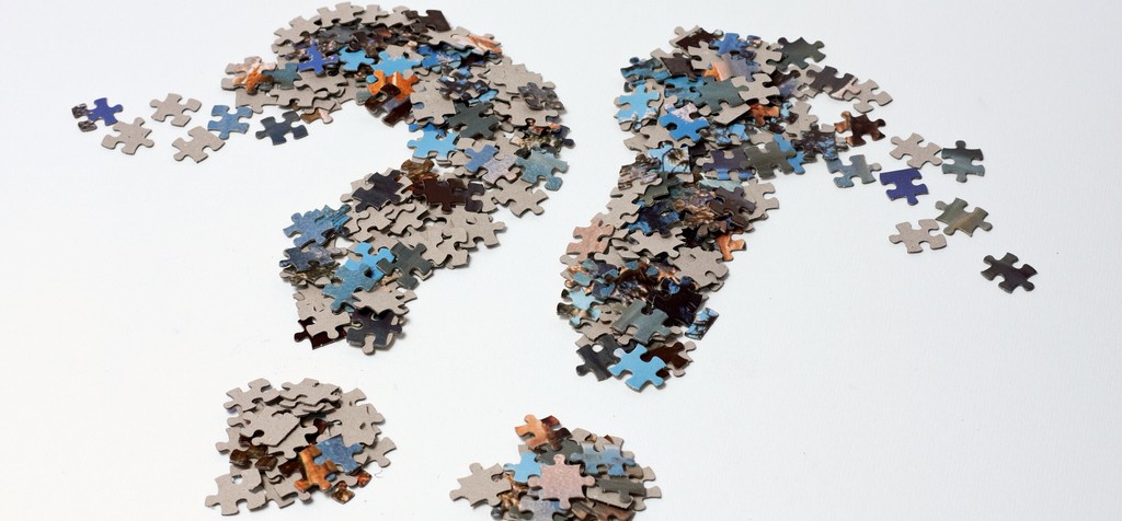 A question and exclamation mark of jigsaw puzzle pieces